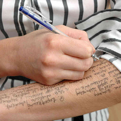 how to cheat on a test with notes on your arms/legs